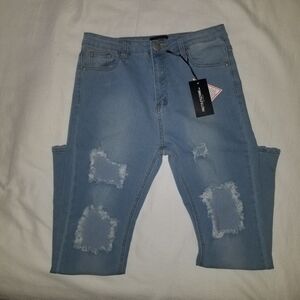 NWT PrettyLittletThing Extreme Rip Jeans